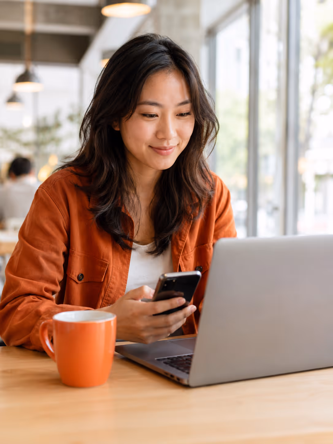 Analyzing a candidate digital footprint on a laptop and phone